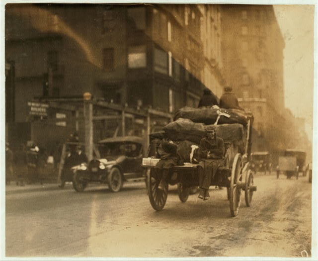 [P.M. Delivery boys on Tremont Street, "getting a...