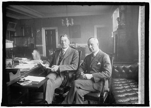 Sec. of Navy Wilbur & Capt. W.J. Cluverius, his new aide,...