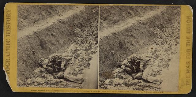A dead rebel soldier, as he lay in the trenches of Fort...