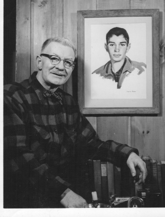 MacIvor Reddie with portrait of his son