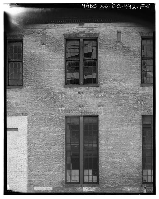 Detail typical first and second story windows, west...