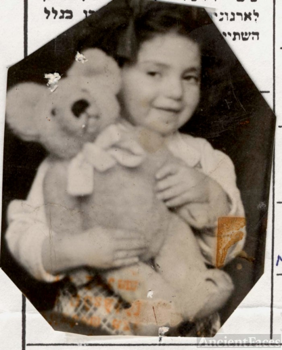 Little girl with her teddy bear