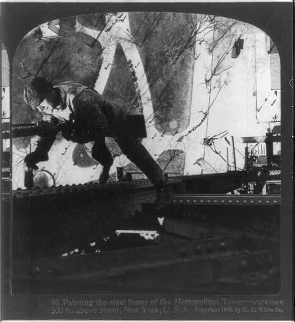 Painting the steel frame of the Metropolitan Tower -...