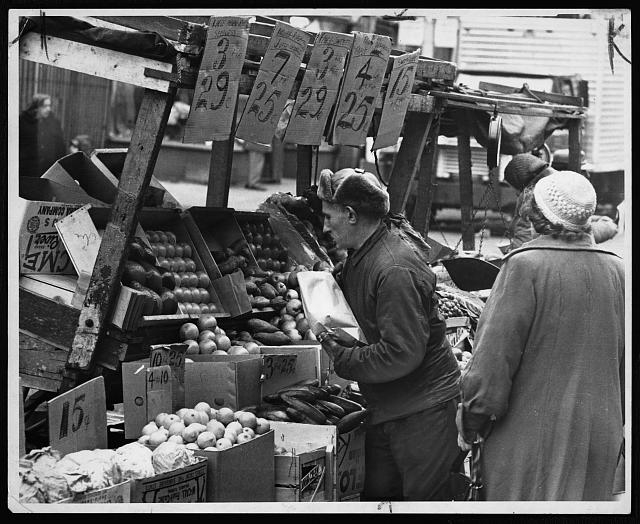 [Vendor selling produce from his pushcart at the Belmont...