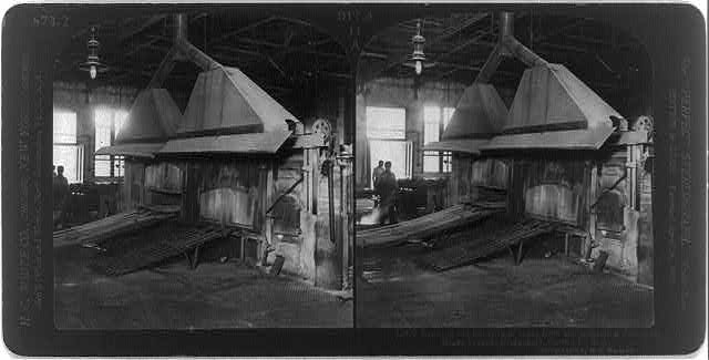 Brass Works, Bridgeport, Conn.: Drawing red hot bars of...
