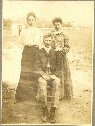 Man with 2 women
