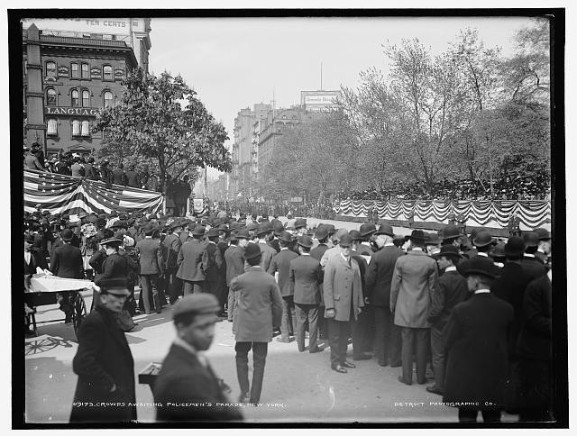 Crowds awaiting policemen's parade, New York