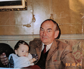 James Seton Fairhurst with his first grandchild, grandson James Seton Fairhurst at his home ShawDene Newbury Berkshire England. 1993