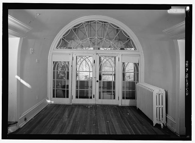 Interior view, first floor, center room, view to door...