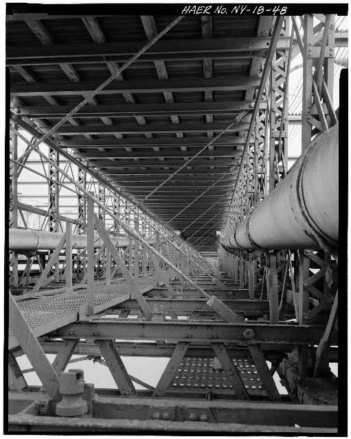 48. View below Promenade at mid-span looking NW at main...