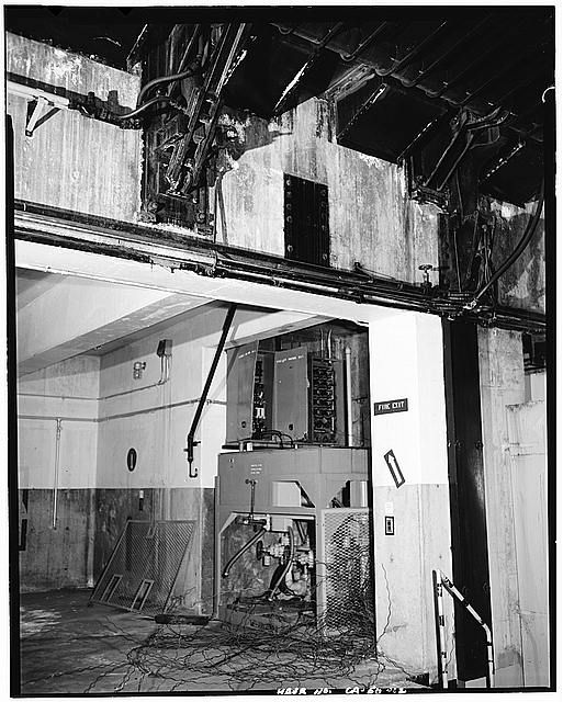 12. VIEW OF HYDRAULIC PUMP INSIDE SILO. ACTUATING ARMS...