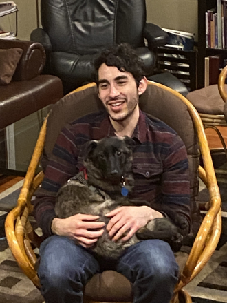 My nephew Paul Rothhammer-Ruiz with his dog Misha