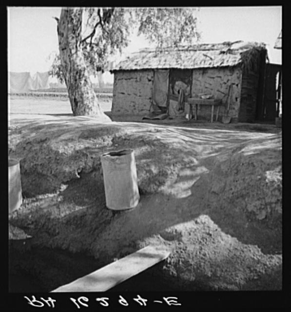 Ditch bank housing for Mexican field workers. Imperial...