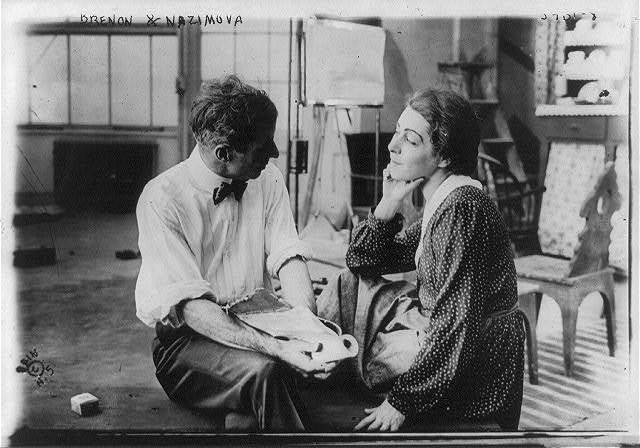 [Herbert Brenon, three-quarters length, seated, right...