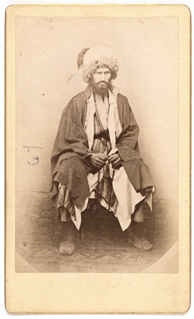 [Full-length portrait of man, seated, facing front]