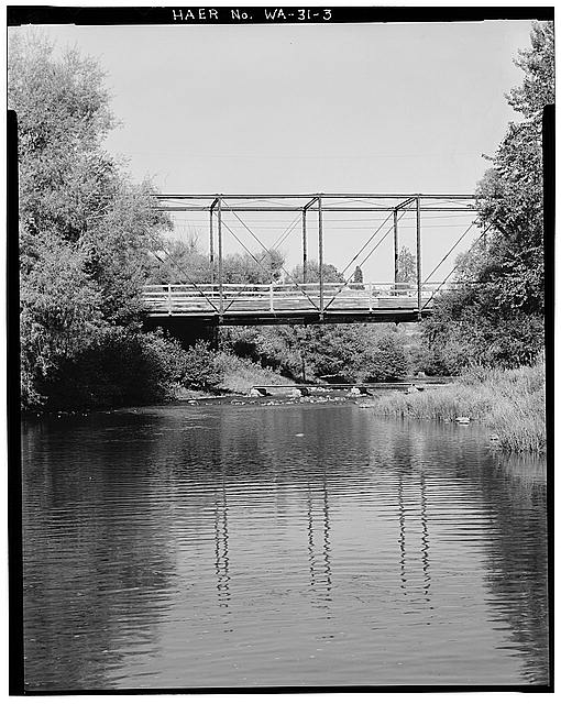 3. CONTEXTUAL VIEW OF BRIDGE, LOOKING EAST FROM RIVER...