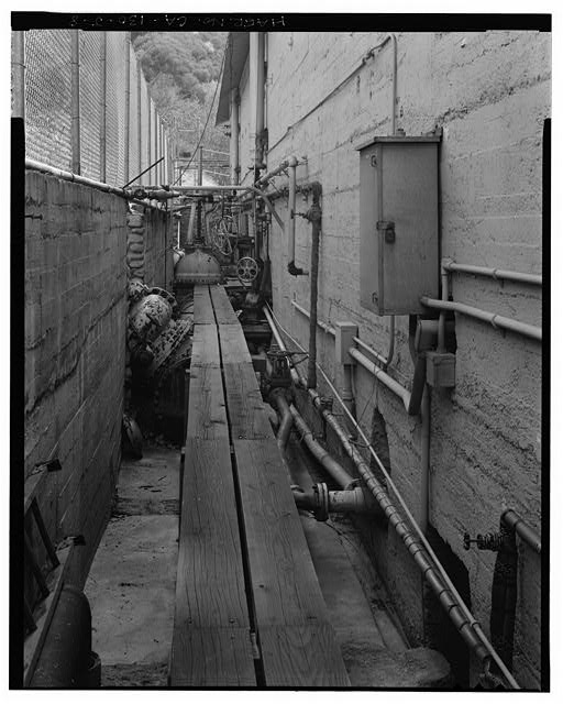 8. NORTHWEST PENSTOCK ENTERING RECEIVER (UNDER PLANKS),...