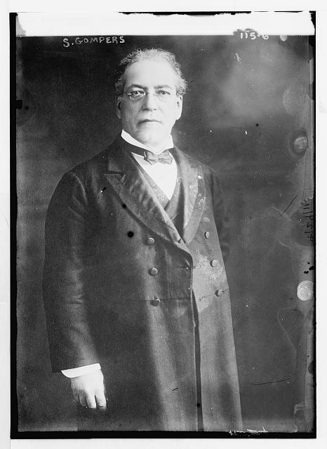 S. Gompers, standing, three-quarters