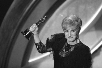 With her Oscar.
