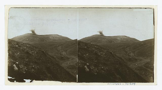 [Japanese shells bursting on 203 Metre Hill, captured by...