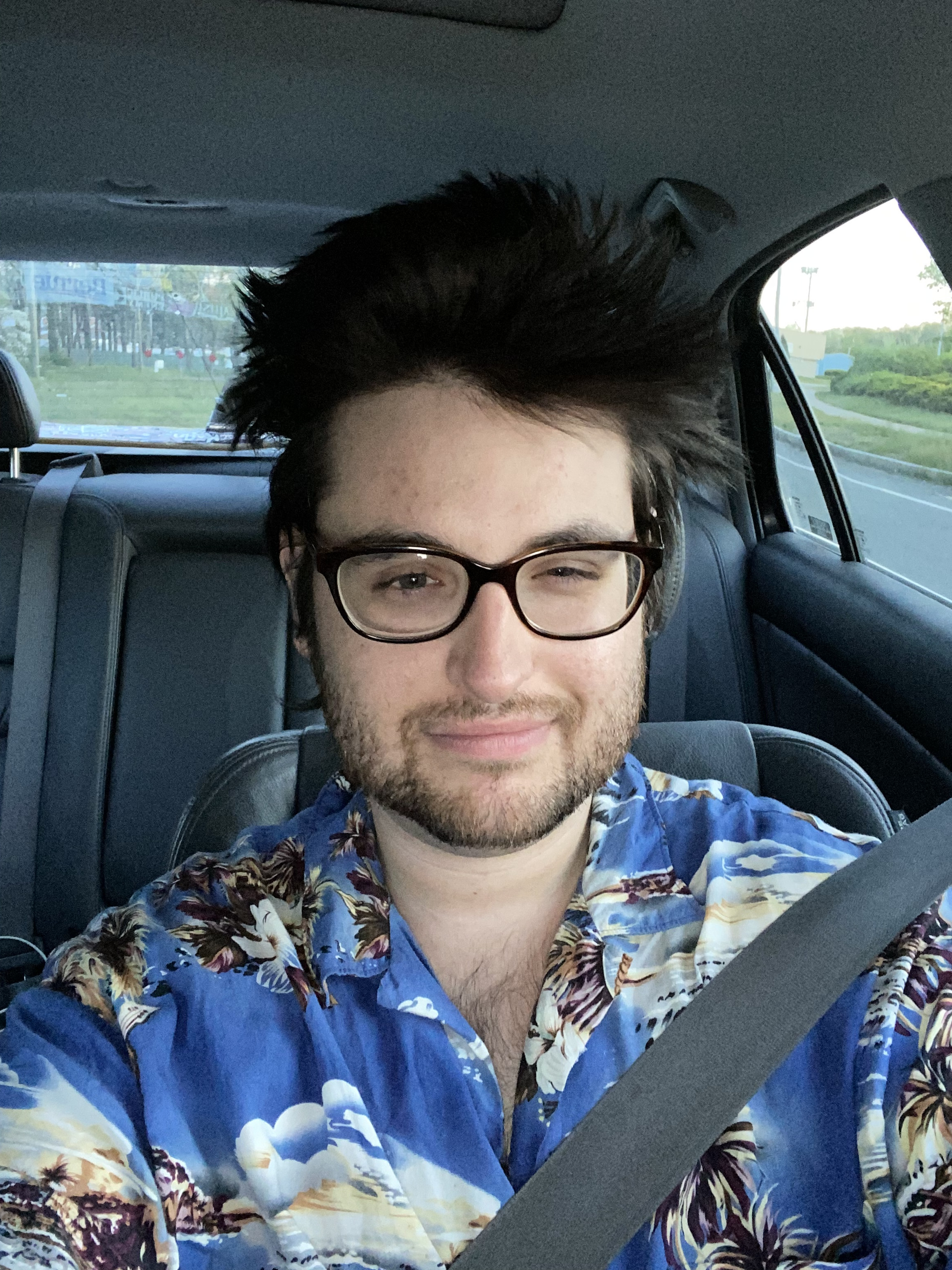 Darius in his car , March 2022
