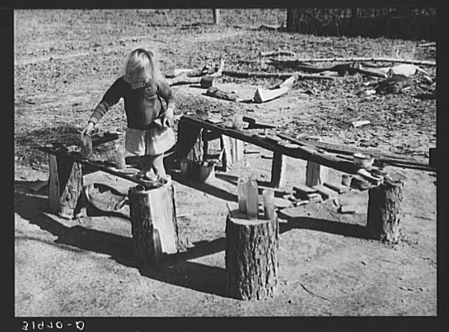 Child of Ed Bagget, sharecropper, playing near Laurel,...