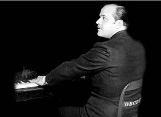 Nacio Herb Brown at the piano.