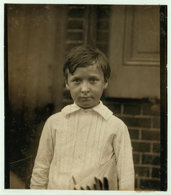 Walter Ray, 400 Walnut St. 8 years of age. Selling papers...