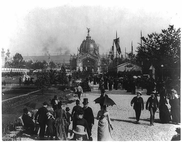 [Crowd of people along parterre beside illuminated...