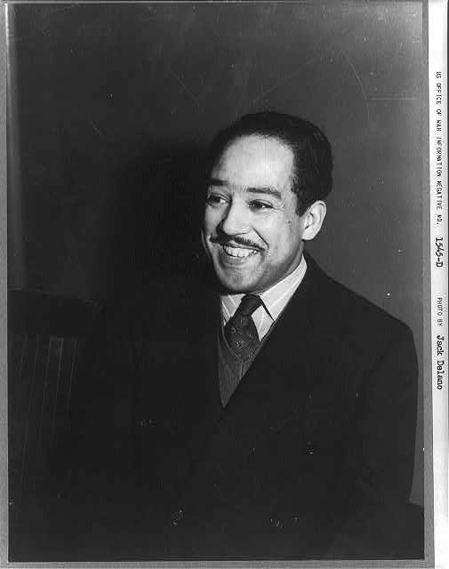 [Langston Hughes, half-length portrait, facing left]