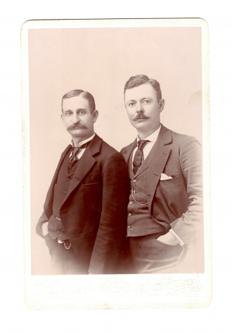 Two mystery faces #21 from Young/Jennings/Cox album,
family of John Howard, 1913-1995