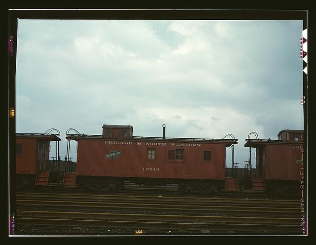 Caboose on the caboose track at C & NW RR's Proviso yard,...