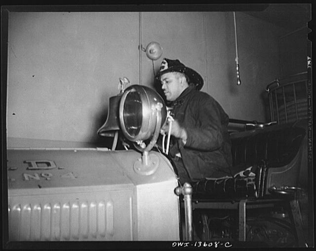 Washington, D.C. Firehouse Station No. 4. Fireman backing...