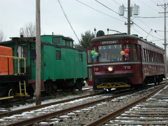 HISTORIC "T" AS THE (#2 LEVI) PASSES MONONGAHELA RAILWAY CABOOSE #73
