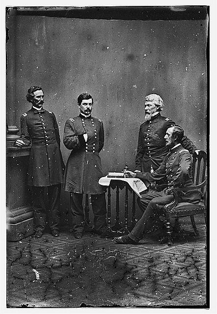 McClellan and staff. L to R: Capt. Clark, Gen. McClellan,...