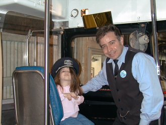 "MR CONDUCTOR" & A LITTLE LADY ON A "T" CAR