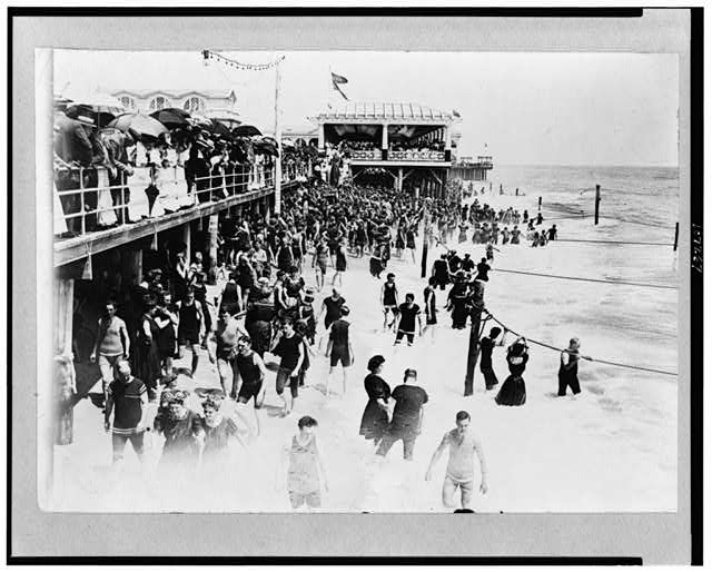 [People on beach and boardwalk at Asbury Park, New Jersey]
