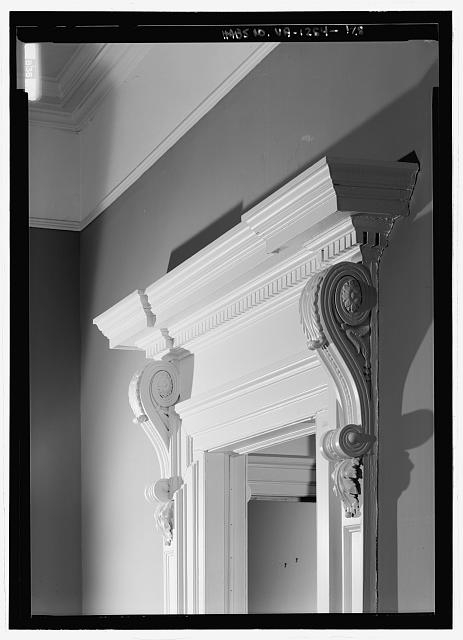 Third floor, room 307, detail view of the pediment and...