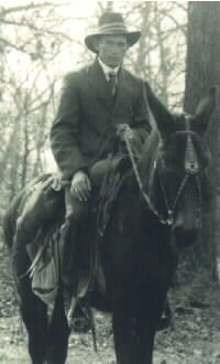 James H. McElroy and horse