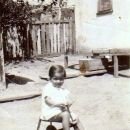 Virginia Espinoza on a tricycle