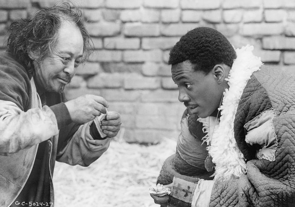 Victor Wong and Eddie Murphy.