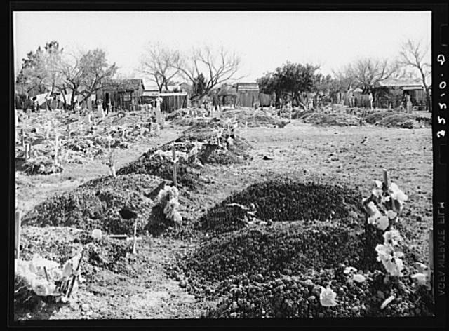 New Mexican graves in cemetery. Raymondville, Texas