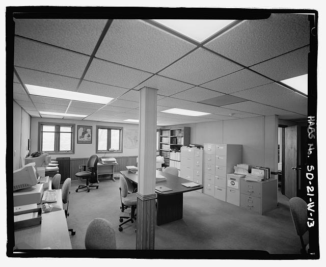 13. Interior view of office space with multiple stations;...