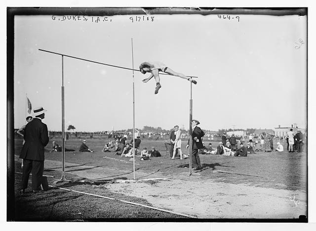 G. Dukes, I.A.C., high-jumping [i.e., pole vaulting],...