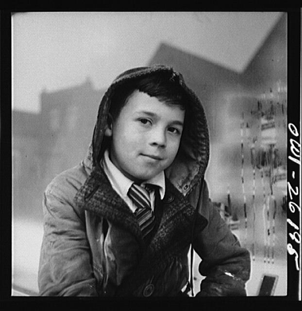 Buffalo, New York. Peter Grimm, age ten, waiting with his...