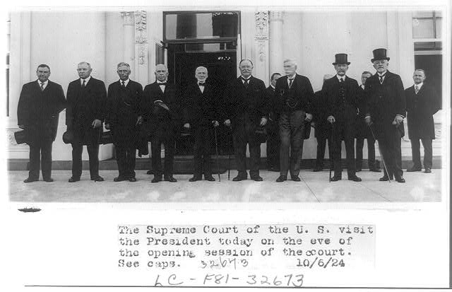 [Nine justices of the United States Supreme Court posed...