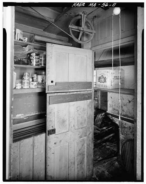 11. VIEW OF ELEVATOR MACHINE ROOM IN BASEMENT BELOW SHAFT...