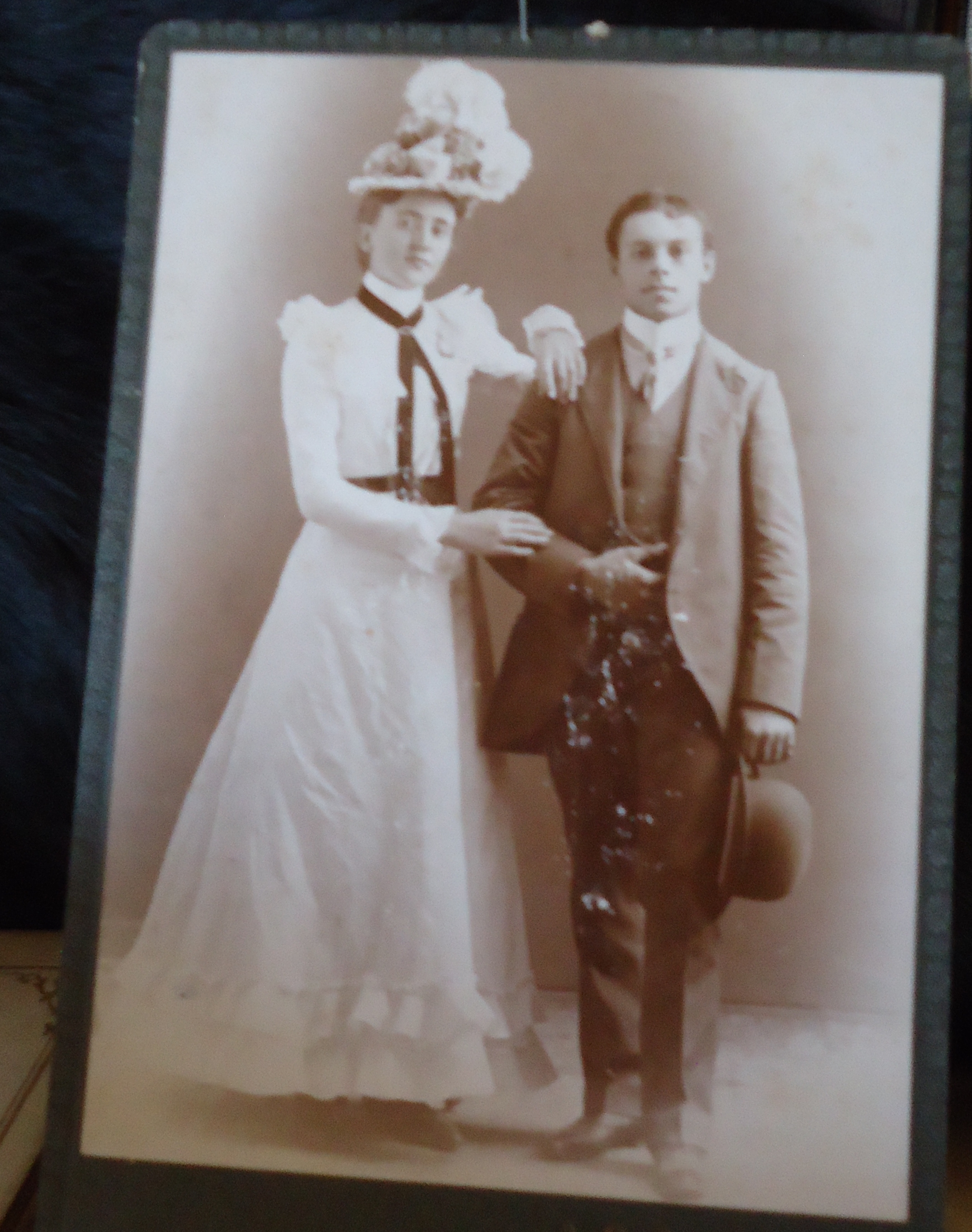 Unknown couple & hat