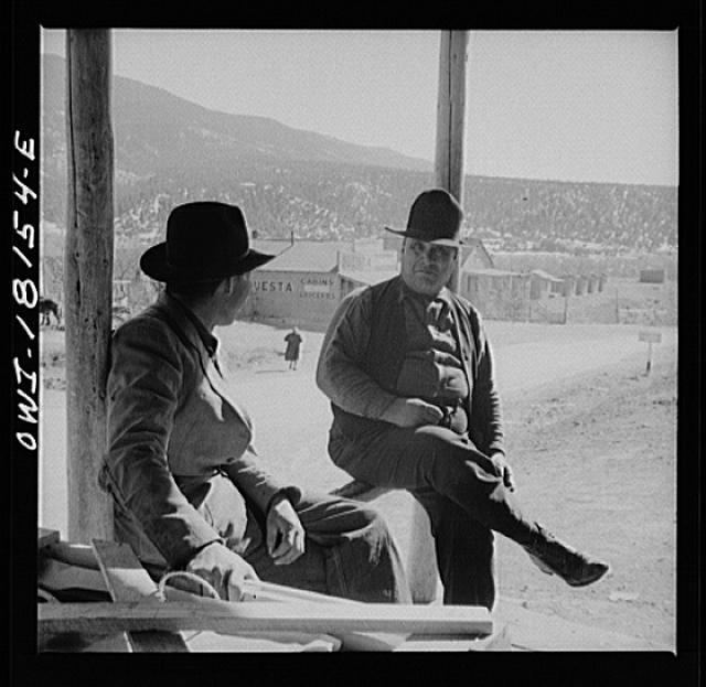 Questa, New Mexico. Men in front of the general store
