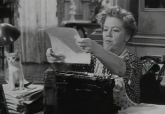 Spring Byington with Paper Weight Kitten.